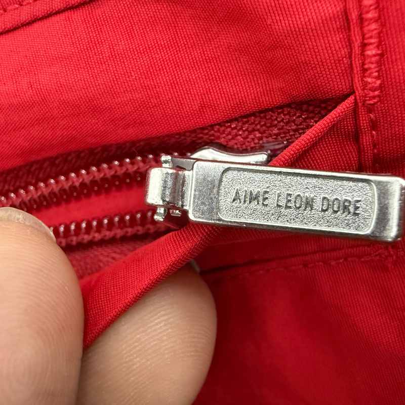 Conjunto Aimé Leon Dore x Porsche Nylon Track Red
