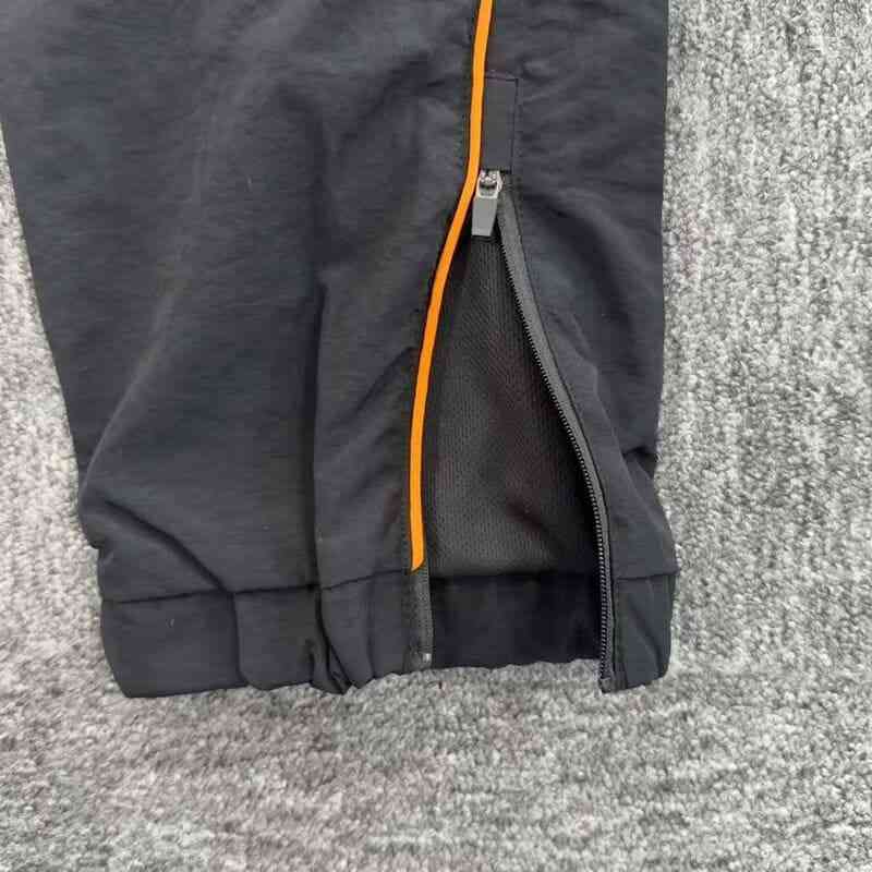 Conjunto Synaworld 'Syna Logo' Shell Black/Orange