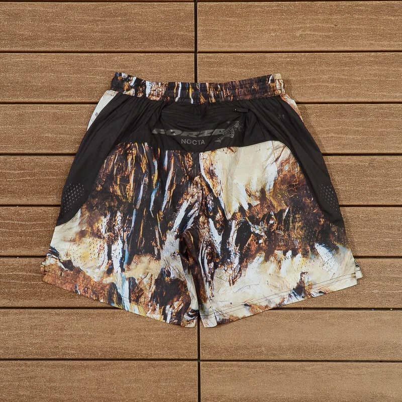 Conjunto Nike x NOCTA Running Camo